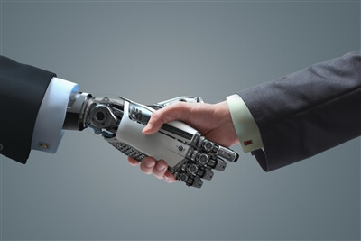 professional robotics trends in the multiservice industry - hand of a man and hand of a robot